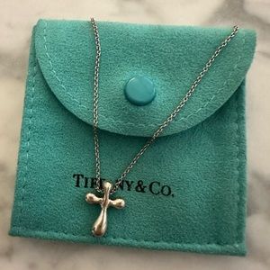 Sterling silver, Tiffany & Co. Elsa Peretti cross necklace. Charm necklace.